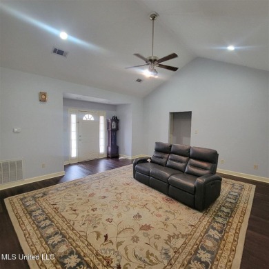 Modern single-family home for sale in Diamondhead, MS!-Luxury on Diamondhead Country Club in Mississippi - for sale on GolfHomes.com, golf home, golf lot