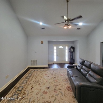 Modern single-family home for sale in Diamondhead, MS!-Luxury on Diamondhead Country Club in Mississippi - for sale on GolfHomes.com, golf home, golf lot