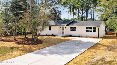 This beautifully renovated single-story home offers a modern on The Lakes Country Club in North Carolina - for sale on GolfHomes.com, golf home, golf lot