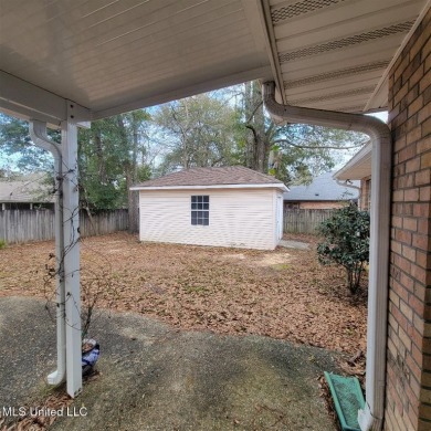 Modern single-family home for sale in Diamondhead, MS!-Luxury on Diamondhead Country Club in Mississippi - for sale on GolfHomes.com, golf home, golf lot