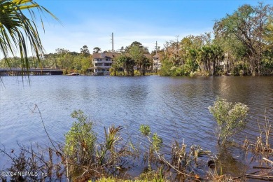 Riverviews and a sparkling pool Everyday on this huge 1/2 acre on Hyde Park Golf Club in Florida - for sale on GolfHomes.com, golf home, golf lot