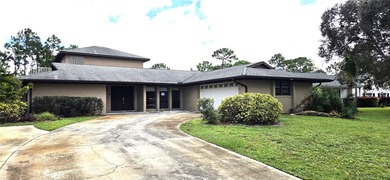 Spacious and versatile, this 4-bedroom, 3-bath home with a on Golf Hammock Country Club in Florida - for sale on GolfHomes.com, golf home, golf lot