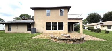 Spacious and versatile, this 4-bedroom, 3-bath home with a on Golf Hammock Country Club in Florida - for sale on GolfHomes.com, golf home, golf lot