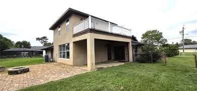 Spacious and versatile, this 4-bedroom, 3-bath home with a on Golf Hammock Country Club in Florida - for sale on GolfHomes.com, golf home, golf lot