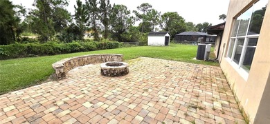 Spacious and versatile, this 4-bedroom, 3-bath home with a on Golf Hammock Country Club in Florida - for sale on GolfHomes.com, golf home, golf lot