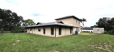 Spacious and versatile, this 4-bedroom, 3-bath home with a on Golf Hammock Country Club in Florida - for sale on GolfHomes.com, golf home, golf lot