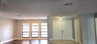 Spacious and versatile, this 4-bedroom, 3-bath home with a on Golf Hammock Country Club in Florida - for sale on GolfHomes.com, golf home, golf lot