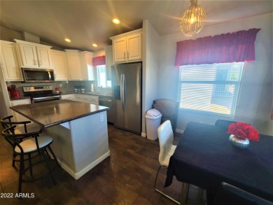 This 2-bedroom, 2-bathroom home features an open floor plan and on Viewpoint Golf Resort in Arizona - for sale on GolfHomes.com, golf home, golf lot