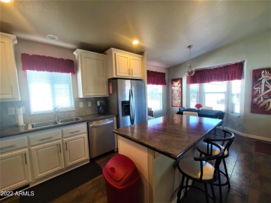 This 2-bedroom, 2-bathroom home features an open floor plan and on Viewpoint Golf Resort in Arizona - for sale on GolfHomes.com, golf home, golf lot