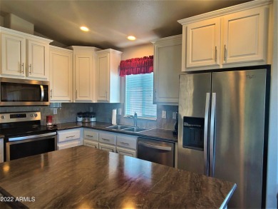 This 2-bedroom, 2-bathroom home features an open floor plan and on Viewpoint Golf Resort in Arizona - for sale on GolfHomes.com, golf home, golf lot