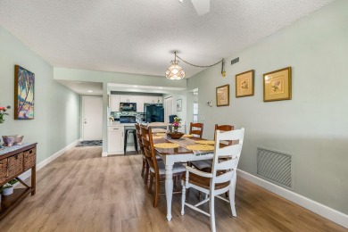 This condo has been totally updated new kitchen, new flooring on Vista Plantation Golf Club in Florida - for sale on GolfHomes.com, golf home, golf lot