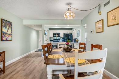 This condo has been totally updated new kitchen, new flooring on Vista Plantation Golf Club in Florida - for sale on GolfHomes.com, golf home, golf lot