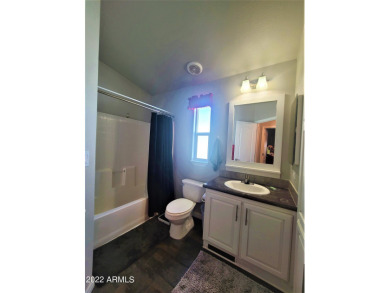 This 2-bedroom, 2-bathroom home features an open floor plan and on Viewpoint Golf Resort in Arizona - for sale on GolfHomes.com, golf home, golf lot