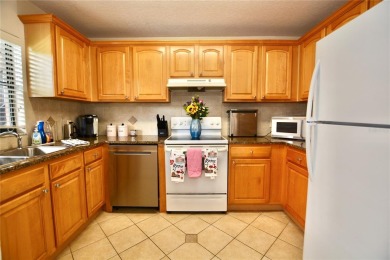 Discover this inviting 2-bedroom, 2-bath condo, perfectly on Pasadena Yacht and Country Club in Florida - for sale on GolfHomes.com, golf home, golf lot
