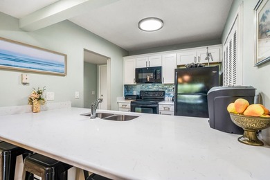 This condo has been totally updated new kitchen, new flooring on Vista Plantation Golf Club in Florida - for sale on GolfHomes.com, golf home, golf lot