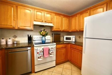 Discover this inviting 2-bedroom, 2-bath condo, perfectly on Pasadena Yacht and Country Club in Florida - for sale on GolfHomes.com, golf home, golf lot
