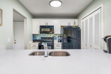 This condo has been totally updated new kitchen, new flooring on Vista Plantation Golf Club in Florida - for sale on GolfHomes.com, golf home, golf lot