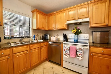 Discover this inviting 2-bedroom, 2-bath condo, perfectly on Pasadena Yacht and Country Club in Florida - for sale on GolfHomes.com, golf home, golf lot