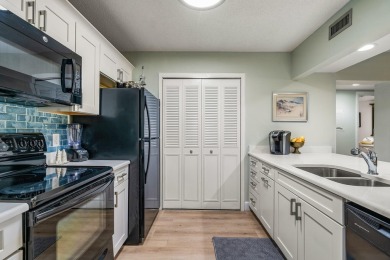 This condo has been totally updated new kitchen, new flooring on Vista Plantation Golf Club in Florida - for sale on GolfHomes.com, golf home, golf lot