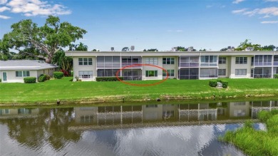 Enjoy your morning coffee and breakfast on your lanai while on University Park Country Club in Florida - for sale on GolfHomes.com, golf home, golf lot