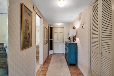 Enjoy your morning coffee and breakfast on your lanai while on University Park Country Club in Florida - for sale on GolfHomes.com, golf home, golf lot