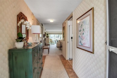 Enjoy your morning coffee and breakfast on your lanai while on University Park Country Club in Florida - for sale on GolfHomes.com, golf home, golf lot