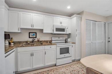 Enjoy your morning coffee and breakfast on your lanai while on University Park Country Club in Florida - for sale on GolfHomes.com, golf home, golf lot