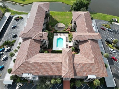 Discover this inviting 2-bedroom, 2-bath condo, perfectly on Pasadena Yacht and Country Club in Florida - for sale on GolfHomes.com, golf home, golf lot