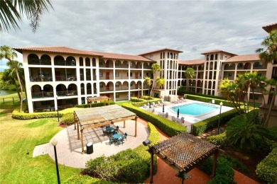 Discover this inviting 2-bedroom, 2-bath condo, perfectly on Pasadena Yacht and Country Club in Florida - for sale on GolfHomes.com, golf home, golf lot