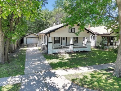 Charming bungalow style home located in the heart of Riverside on Arthur B. Sim Park Golf Course in Kansas - for sale on GolfHomes.com, golf home, golf lot