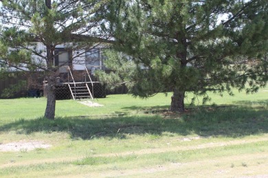 Nestled across the street from the golf course and just a minute on Clayton Golf Club in New Mexico - for sale on GolfHomes.com, golf home, golf lot