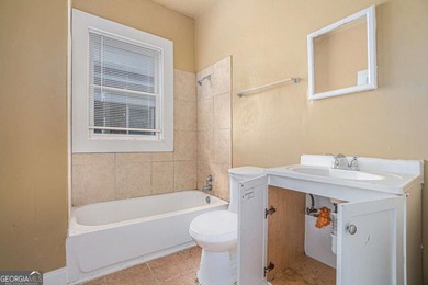 Sold as-is, this investor-friendly ranch home presents a rare on John A. White Golf Course in Georgia - for sale on GolfHomes.com, golf home, golf lot