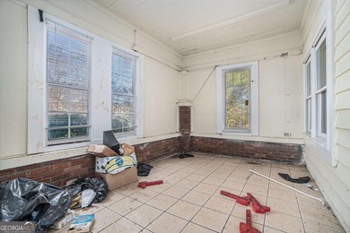 Sold as-is, this investor-friendly ranch home presents a rare on John A. White Golf Course in Georgia - for sale on GolfHomes.com, golf home, golf lot