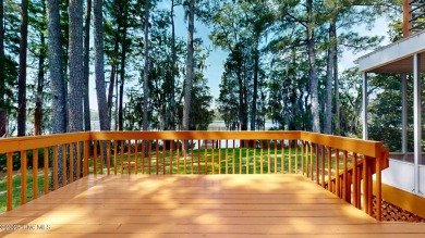 Don't miss this rare opportunity to own a waterfront home with a on Harbour Point Golf Club in North Carolina - for sale on GolfHomes.com, golf home, golf lot