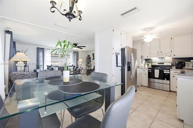 PRIDE OF OWNERSHIP SHINES THROUGHOUT THIS IMMACULATE AND on Davie Golf Club in Florida - for sale on GolfHomes.com, golf home, golf lot