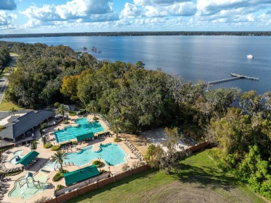 Seller Motivated!   Welcome To This Beautifully Refreshed on Eagle Harbor Golf Club in Florida - for sale on GolfHomes.com, golf home, golf lot