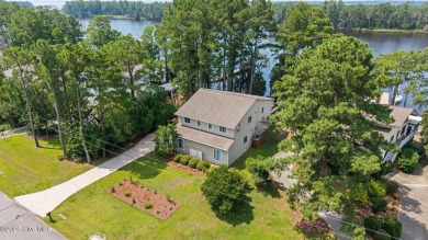 Don't miss this rare opportunity to own a waterfront home with a on Harbour Point Golf Club in North Carolina - for sale on GolfHomes.com, golf home, golf lot