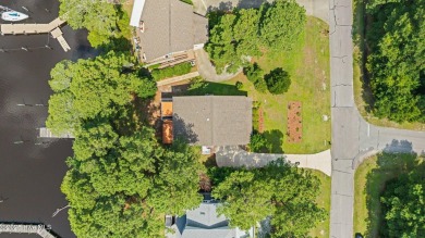 Don't miss this rare opportunity to own a waterfront home with a on Harbour Point Golf Club in North Carolina - for sale on GolfHomes.com, golf home, golf lot