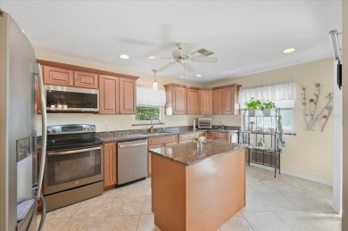 Welcome to this beautifully maintained 2-bedroom, 2-bath home in on Sandpiper Golf Club in Florida - for sale on GolfHomes.com, golf home, golf lot