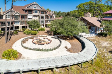This splendid .944-acre wooded lot is situated within the secure on Sharks Tooth Golf Club in Florida - for sale on GolfHomes.com, golf home, golf lot