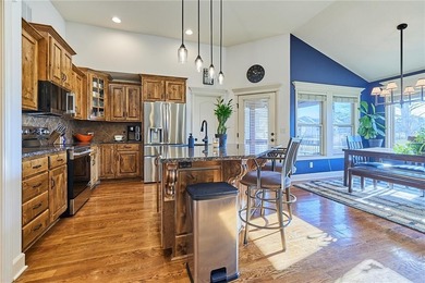 Welcome home to 707 Tomahawk Court! This immaculate, elevated on Paradise Pointe Golf Complex in Missouri - for sale on GolfHomes.com, golf home, golf lot