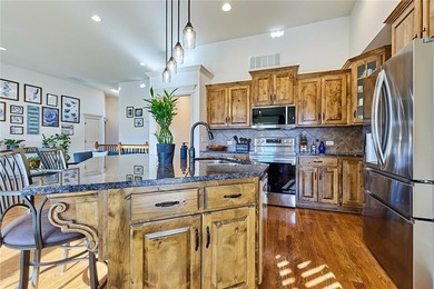 Welcome home to 707 Tomahawk Court! This immaculate, elevated on Paradise Pointe Golf Complex in Missouri - for sale on GolfHomes.com, golf home, golf lot