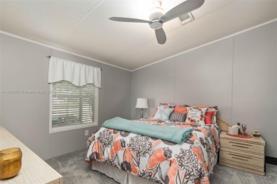 Welcome to this BEAUTIFUL, meticulously maintained manufactured on Davie Golf Club in Florida - for sale on GolfHomes.com, golf home, golf lot