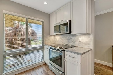 This amazing second floor end-unit is a show stopper! It on The Glades Golf and Country Club in Florida - for sale on GolfHomes.com, golf home, golf lot