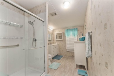 Welcome to this BEAUTIFUL, meticulously maintained manufactured on Davie Golf Club in Florida - for sale on GolfHomes.com, golf home, golf lot