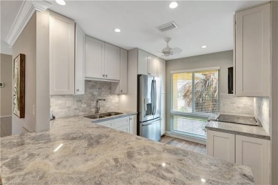 This amazing second floor end-unit is a show stopper! It on The Glades Golf and Country Club in Florida - for sale on GolfHomes.com, golf home, golf lot