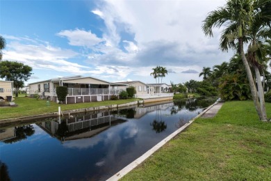 Welcome to this BEAUTIFUL, meticulously maintained manufactured on Davie Golf Club in Florida - for sale on GolfHomes.com, golf home, golf lot