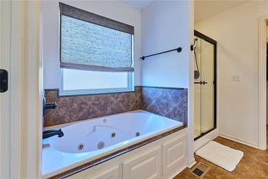 Welcome home to 707 Tomahawk Court! This immaculate, elevated on Paradise Pointe Golf Complex in Missouri - for sale on GolfHomes.com, golf home, golf lot