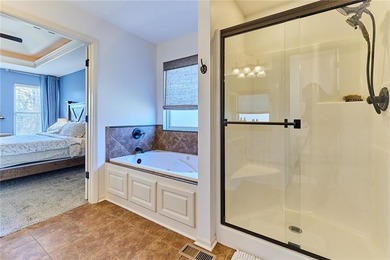 Welcome home to 707 Tomahawk Court! This immaculate, elevated on Paradise Pointe Golf Complex in Missouri - for sale on GolfHomes.com, golf home, golf lot