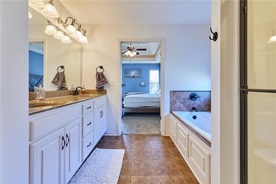 Welcome home to 707 Tomahawk Court! This immaculate, elevated on Paradise Pointe Golf Complex in Missouri - for sale on GolfHomes.com, golf home, golf lot